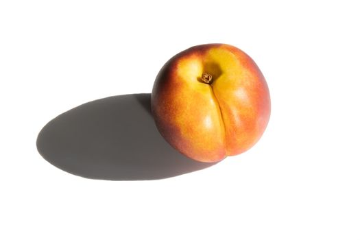 peach with shadow on white background, tasty food