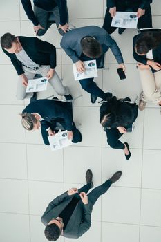 top view. Manager asks questions during a business meeting. business concept.