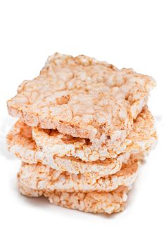 A Stack of Square Rice Cakes - Isolated on White. Dietary Crispbread - Isolation