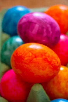 Out of focus, blurry background, Easter multi-colored eggs