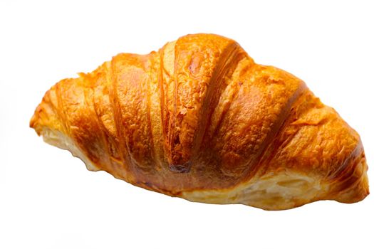 Delicious fresh croissant on a white background. Baking