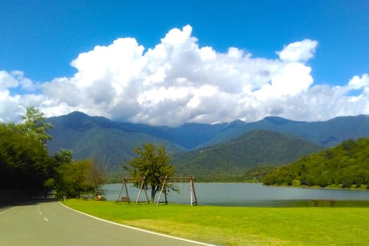 Scenic view of the lake in the mountains on a sunny day