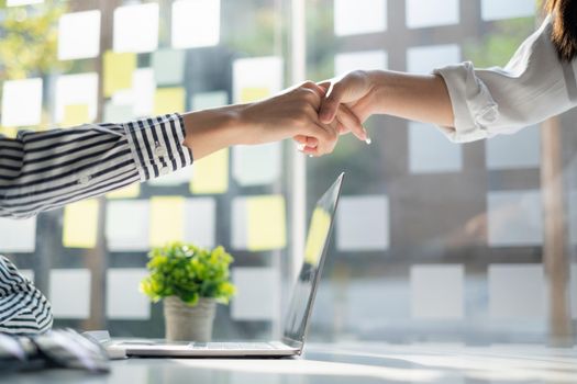 Business partnership meeting concept. Image business women handshake. Successful business people handshaking after good deal. Group support concept