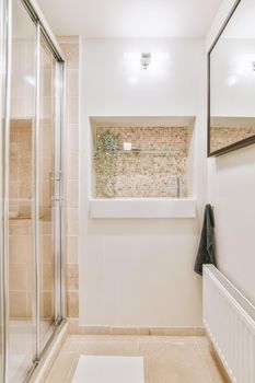 Bathroom with shower and sink in a modern and cozy house