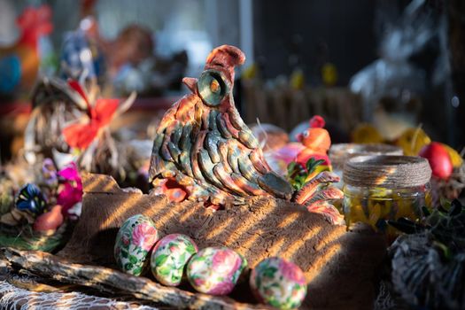 Handmade hen and Easter eggs by an artist as an Easter decoration.