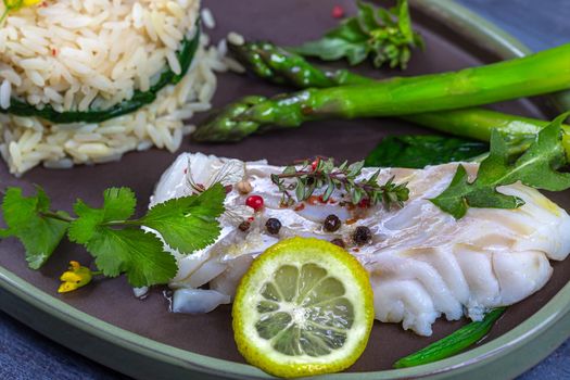 Cod back and steamed side dishes.