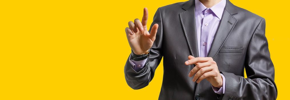 Businessman hand touching map point, network connection, international meaning, copy space yellow background
