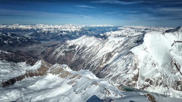 Amazing view from a drone over the snowy mountain hills