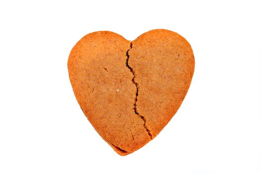 Biscuit like a broken heart shape, isolated on white background