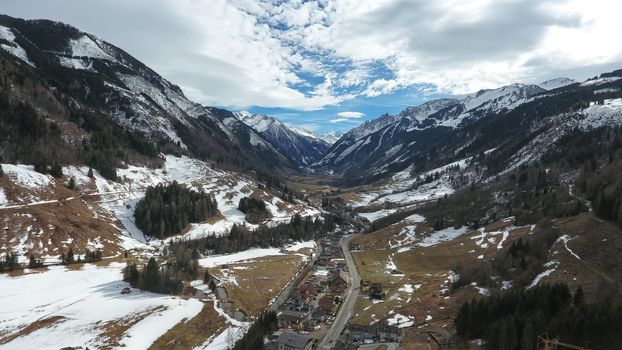 Amazing  aerial view from drone of a small village between mountain hills