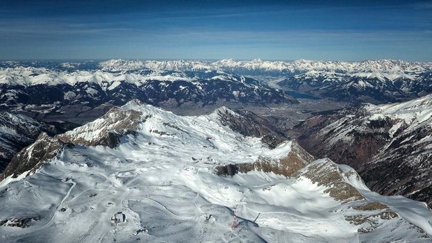 Amazing view from a drone over the snowy mountain hills