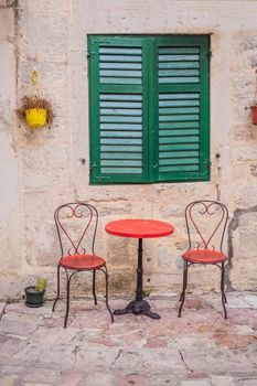 Colorful street in Old town of Kotor on a sunny day, Montenegro.