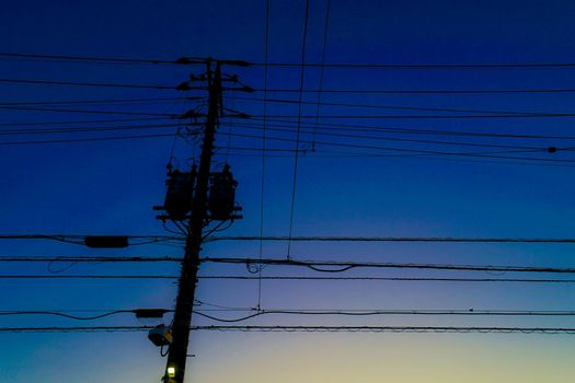 Silhouette of gradient sky and electric wire. Shooting Location: Tokyo metropolitan area