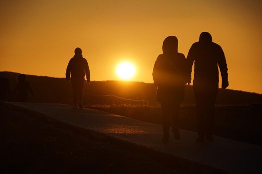 Gotorphoss morning and people silhouette. Shooting Location: Iceland