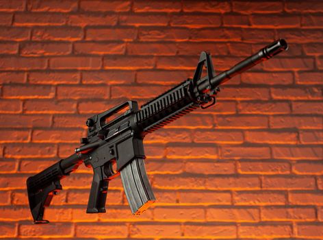 the American army rifle M4A1 against a brick wall