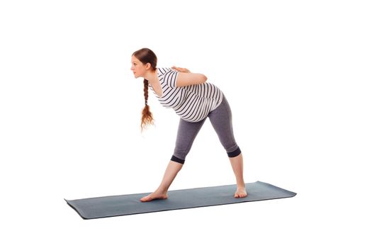 Pregnancy yoga exercise - pregnant woman doing yoga asana parsvottanasana Intense Side Stretch pose isolated on white background