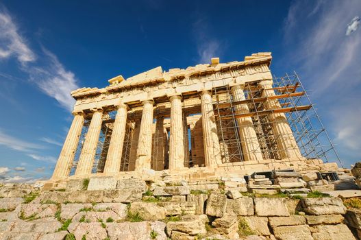 Parthenon temple on a bright day. Acropolis in Athens, Greece..