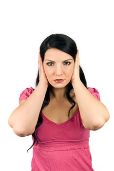 Brunette woman covering  her ears with both hands :I can't hear!