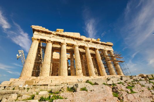 Parthenon temple on a bright day. Acropolis in Athens, Greece..