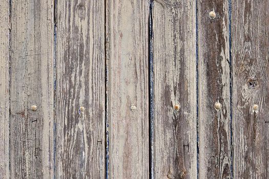 Background from a wall made of vertical wooden planks
