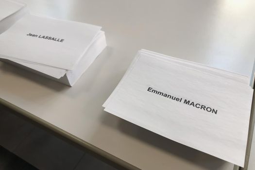 PARIS, FRANCE - APRIL 10, 2022 :Ballots with the names of candidates for elections in France