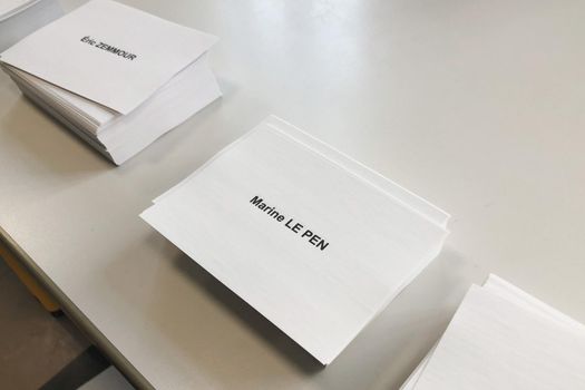 PARIS, FRANCE - APRIL 10, 2022 :Ballots with the names of candidates for elections in France