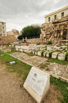 Scenic panoramic view of the Library of Hadrian, Athens, Greece. It is one of the main landmarks of Athens. Beautiful scenery of Athens with ancient Greek ruins.