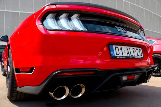 Wroclaw, Poland, August 22, 2021: Beautiful red modern muscle car - Ford Mustang