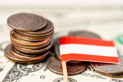 Stack of coins with Austria flag on white background.