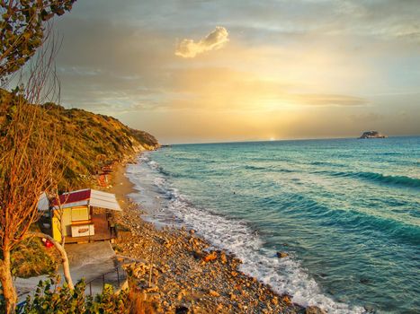 Beautiful colorful sunset at famous beach on Kefalonia Island. Ionian sea, Greece.