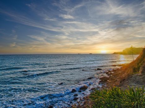 Beautiful colorful sunset at famous beach on Kefalonia Island. Ionian sea, Greece.