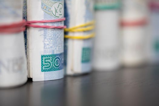 The first plan with a few rolls of paper cash and the second plan gradually blurred.