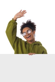 Cheerful black girl with blank banner isolated on white background, copy space for text content