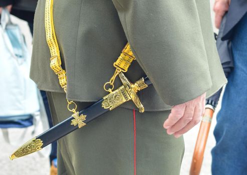 Soviet officer dagger in the hands of veteran in the second world war Military uniform