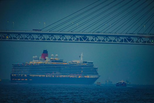Luxury vessel (Queen Elizabeth) and Yokohama Baybridge. Shooting Location: Yokohama-city kanagawa prefecture