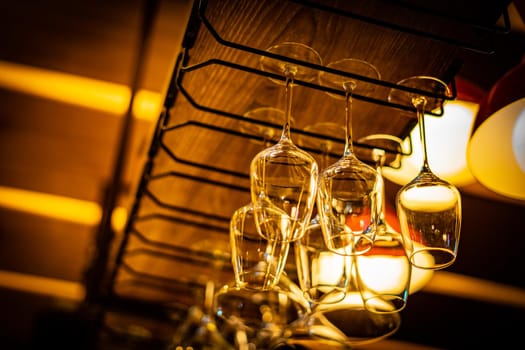 Wine glasses hanging on the ceiling. Shooting Location: Tokyo metropolitan area