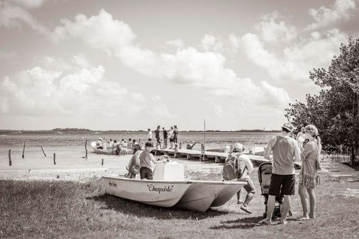 Muyil Mexico 02. February 2022 Old black and white picture of panorama view to the Muyil Lagoon in the tropical jungle nature forest boats people in Sian Ka'an National park Muyil Chunyaxche Mexico.