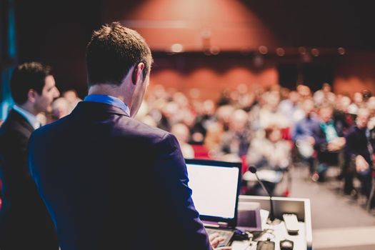 Speaker at Business Conference and Presentation. Audience at the conference hall.