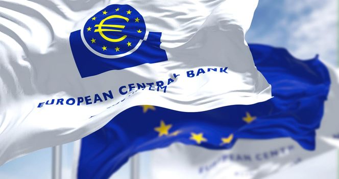 Frankfurt, Germany, February 2022: Flags of the European Central Bank and European Union waving in the wind. Seamless looping in 4K