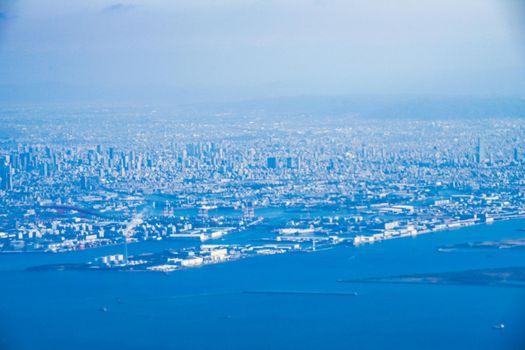 Osaka cityscape seen from the plane. Shooting Location: Osaka Prefecture