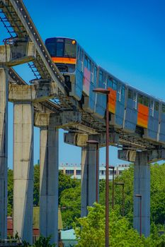 Tama city monorail and fresh green. Shooting Location: Tokyo Metropolitan Hino City