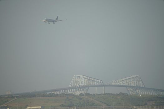 Airplane and Tokyo Gate Bridge. Shooting Location: Tokyo metropolitan area