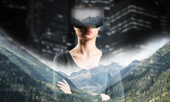 Young attractive woman in VR glasses. Immersion in the virtual world.
