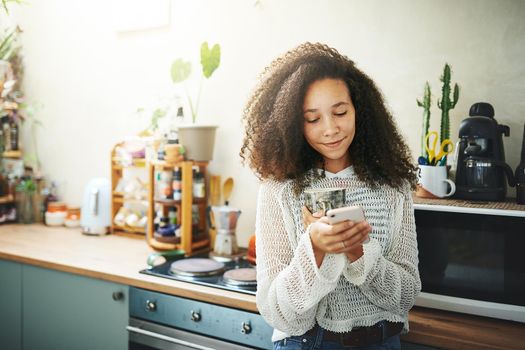 Portrait of a beautiful girl enjoying coffee and social media 