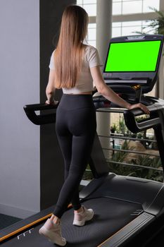 Treadmill indoors young woman length profile full active people, from lifestyle fit in body and training cardio, muscles athletic. Jogging legs slim, friends green screen