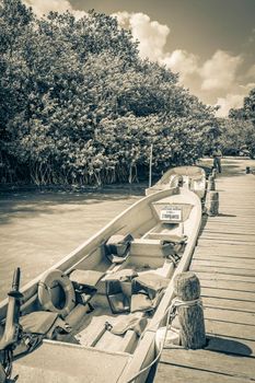 Muyil Mexico 02. February 2022 Old black and white picture of panorama view to the Muyil Lagoon in the tropical jungle nature forest boats people in Sian Ka'an National park Muyil Chunyaxche Mexico.