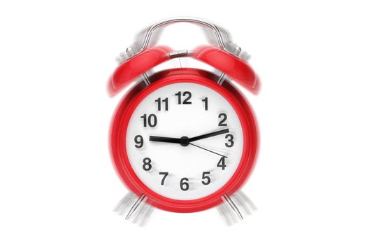 A ringing alarm clock. Red retro alarm clock on white with ringing effect