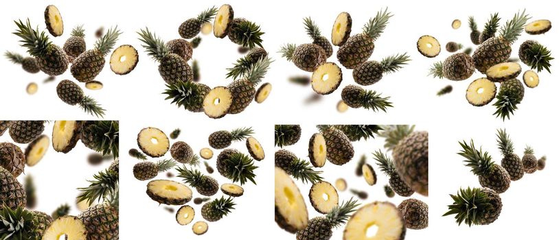 A set of photos. Ripe pineapples levitate on a white background.