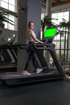 Treadmill indoors woman young length profile full running female, from fitness fit from body for sportswear sporty, muscles together. Jogging legs slim, portrait