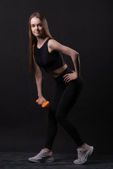 With . A black dumbbells background on beautiful maiden orange orange isolated gym, for shape body for fit from weight diet, happy plus. Chubby big adult, figure young overweight doing